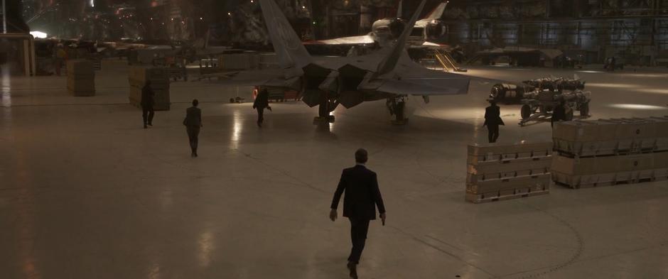 Agents spread out through the hanger searching for Fury and Vers followed by Talos posing as Keller.