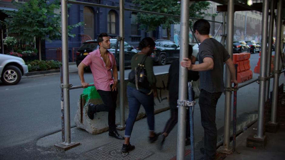 Two assholes catcall women who are walking past.