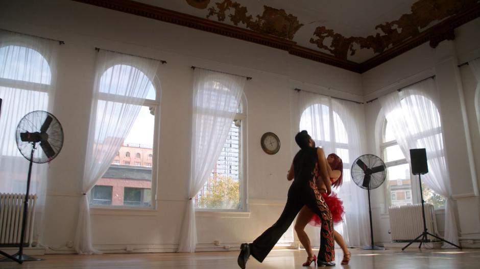 Ravi and Liv dance together during the group rehearsal.