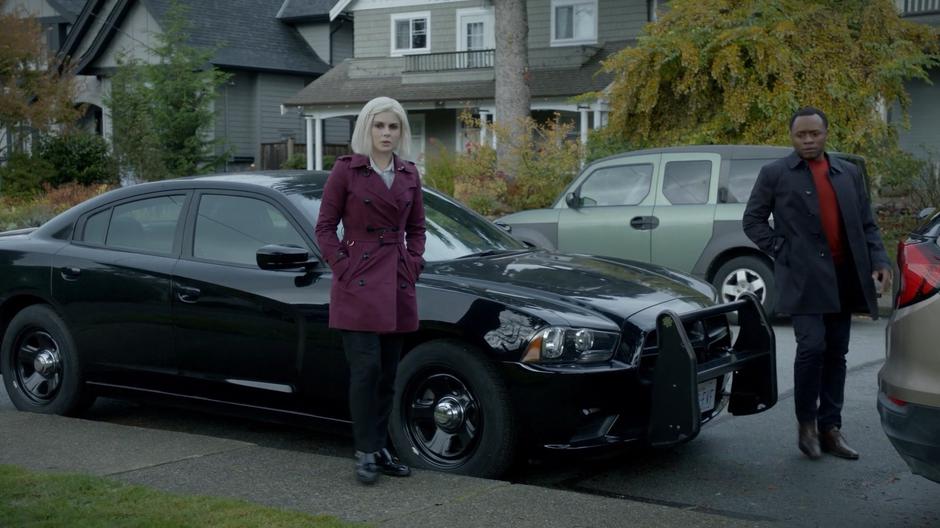 Liv and Clive walk towards the house after exiting the car.