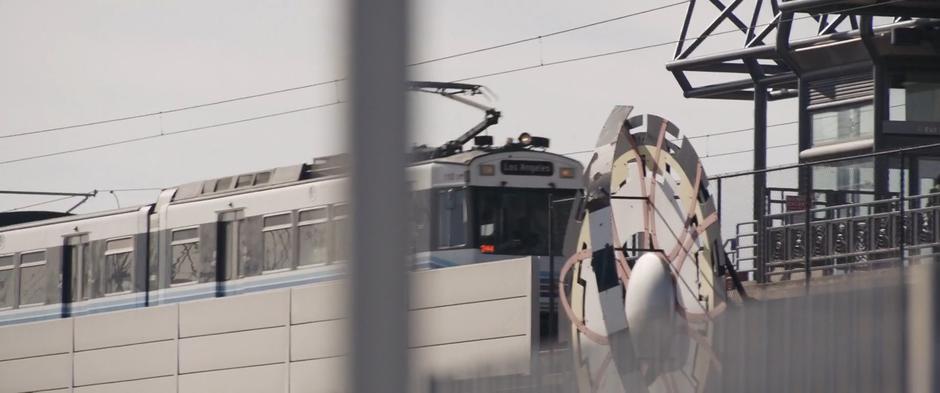 A train pulls into the elevated station.