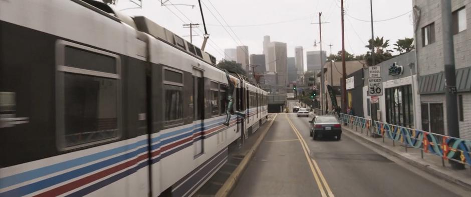 Vers struggles to get back on top of the train as it heads towards a tunnel.