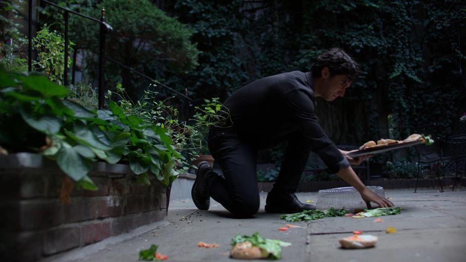 Laurent Lyonne cries while picking up the spilled bagels.