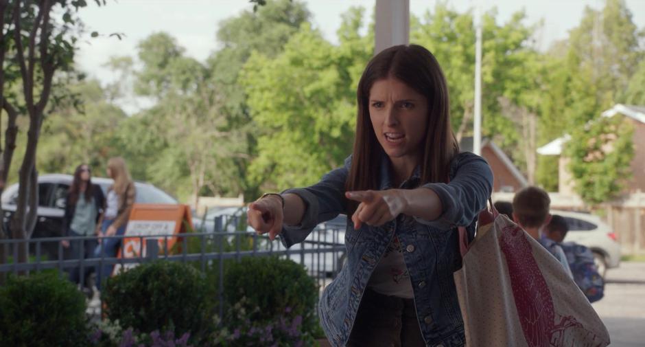 Stephanie points to Miles and Nicky while telling them they are getting a playdate.