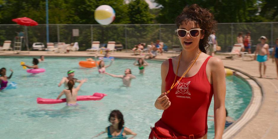 Heather Holloway smiles at Billy as she finishes her lifeguard shift.