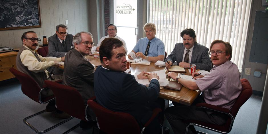 Tom Holloway, Bruce, and the other newspeper employees stare at Nancy when she dares give a story suggestion.
