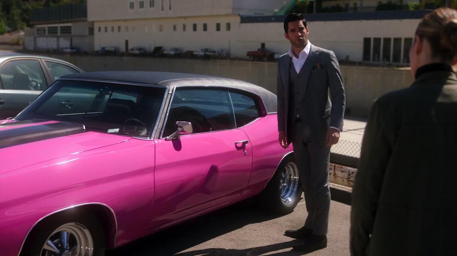 Lucifer reaches for the car while Chloe tells him to wait for forensics.