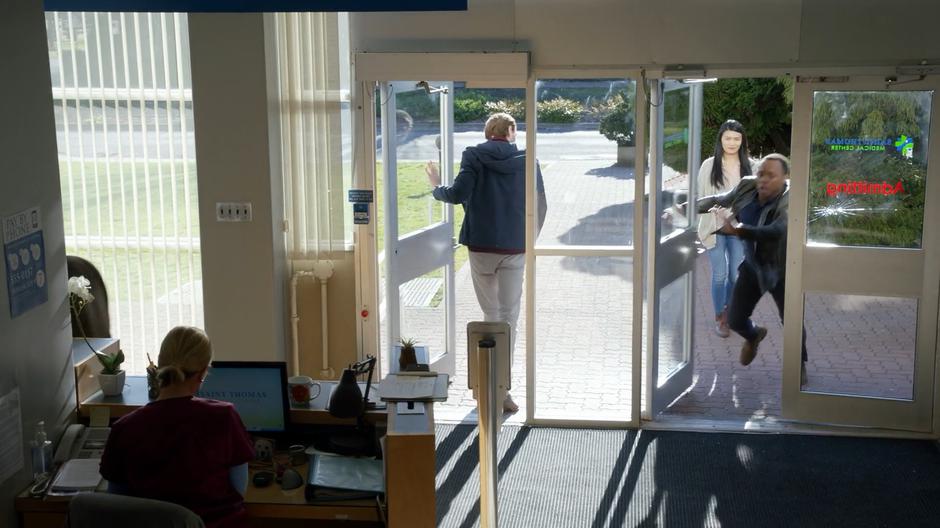 Clive throws open the door of the hospital and races inside looking for Dale after breaking the window in his rush.