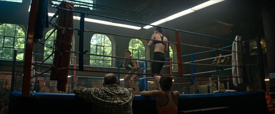 Lara and Rose face off in the ring while Terry and Sophie watch.