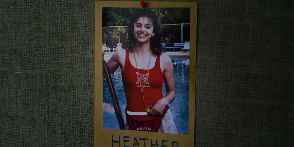 A photo of Heather sits pined to the notice board.