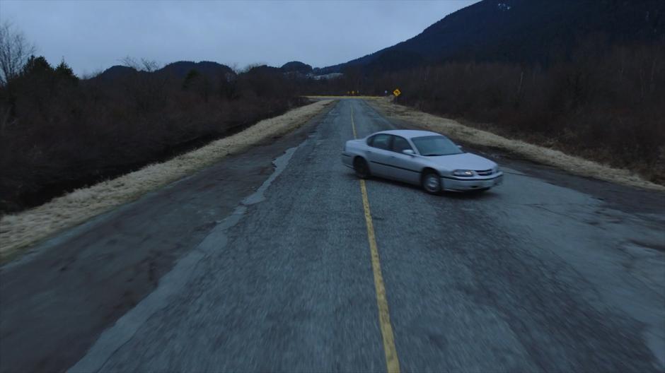 Ben turns the stolen car off the main road.