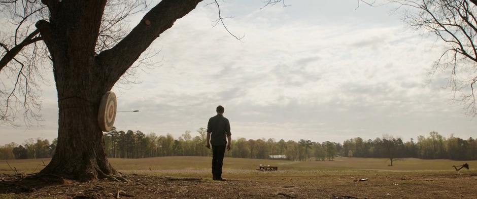 Clint looks around the empty field and sees none of his family.