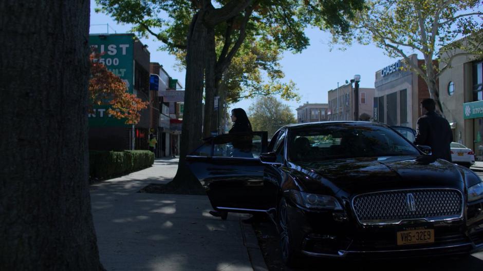 Jessica and Trish exit the town car for the funeral.