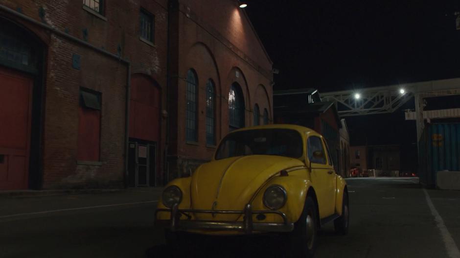 Bumblebee slows to a stop near the dry dock to let out Charlie.