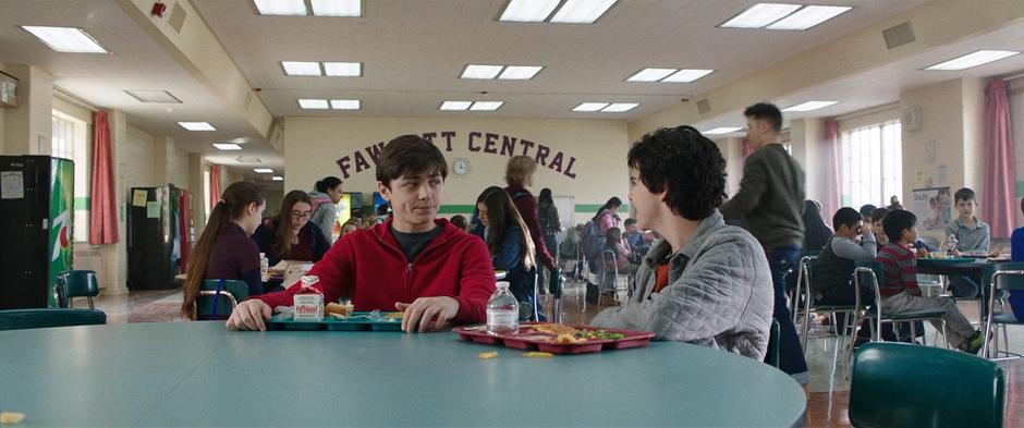 Freddy sits down at Billy's table during lunch.