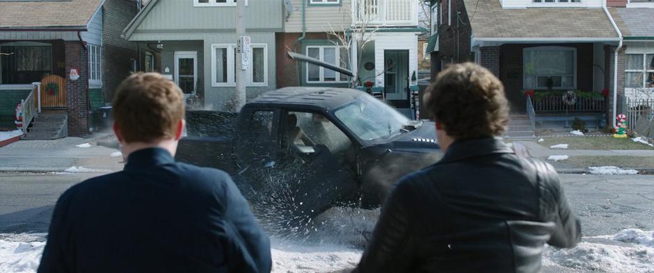 Brett and Burke Breyer watch as their truck crashes into the ground.