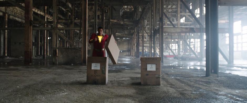 Billy gives Freddy the thumbs up before getting in a box for a burning test.