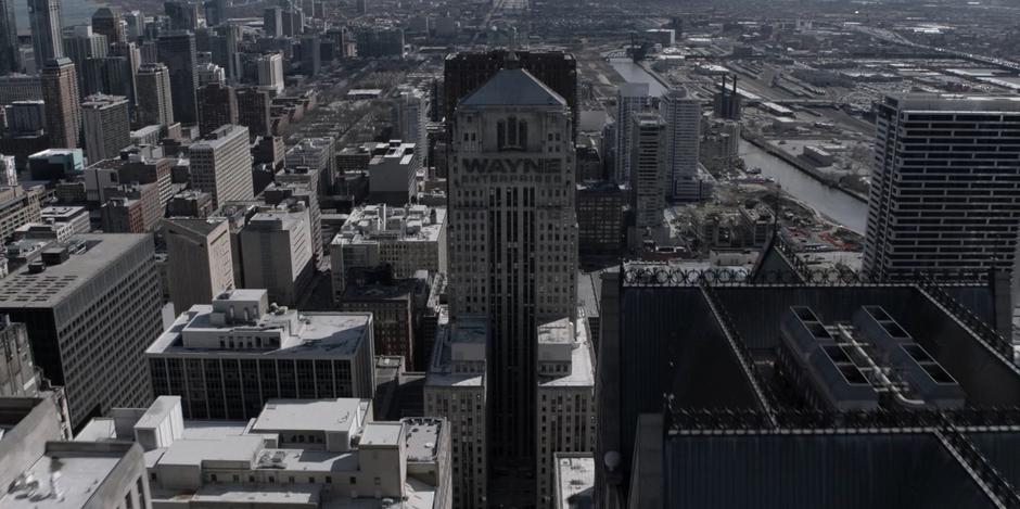 Aerial establishing shot of the abandoned Wayne Enterprises building.