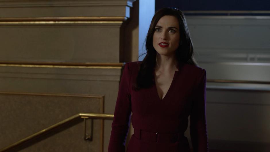 Lena watch as Kara dons her new suit.