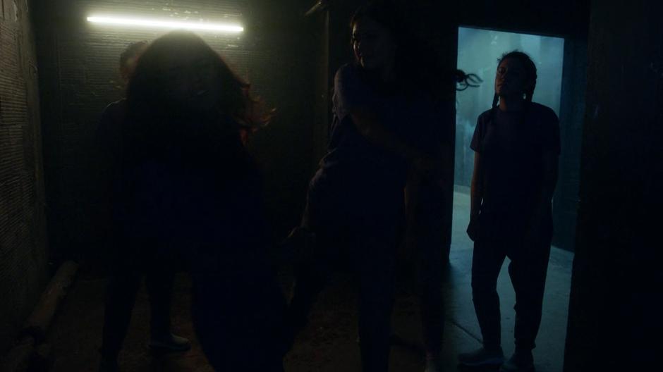 Allegra is attacked by a group of other inmates.