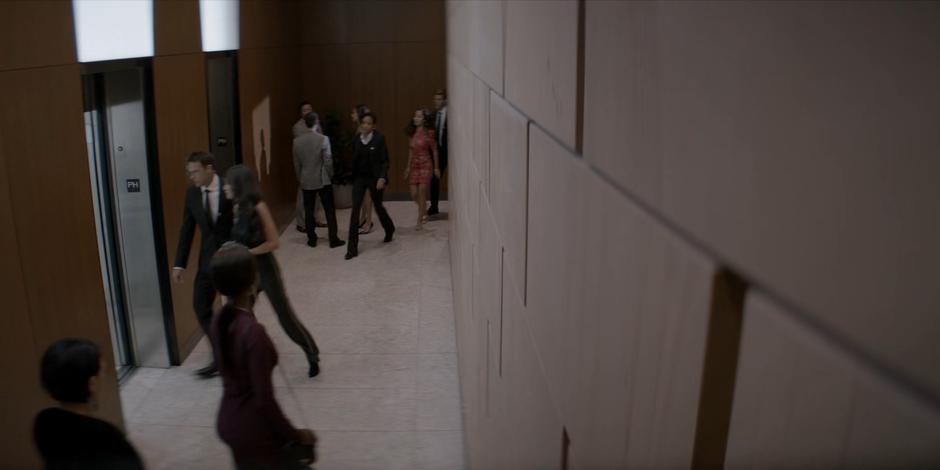 Jacob leads Catherine to one elevator while Sophie and Tyler escort Mary to another.