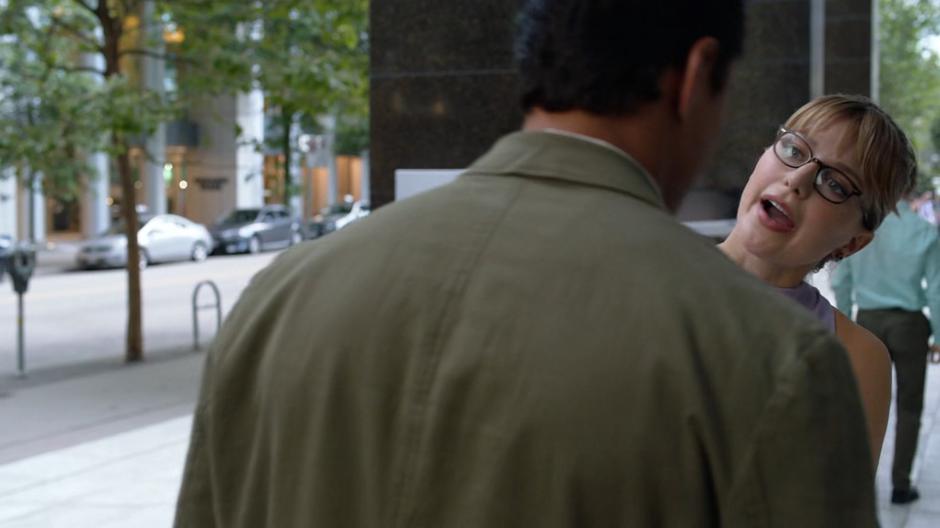 Kara pops her head around when she confronts William outside the CatCo lobby.