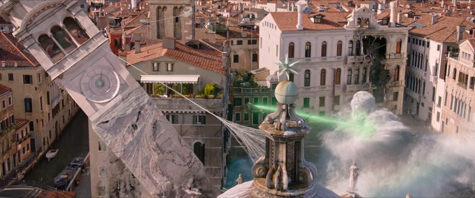 The belltower leans farther to the side as Mysterio fights with the elemental.