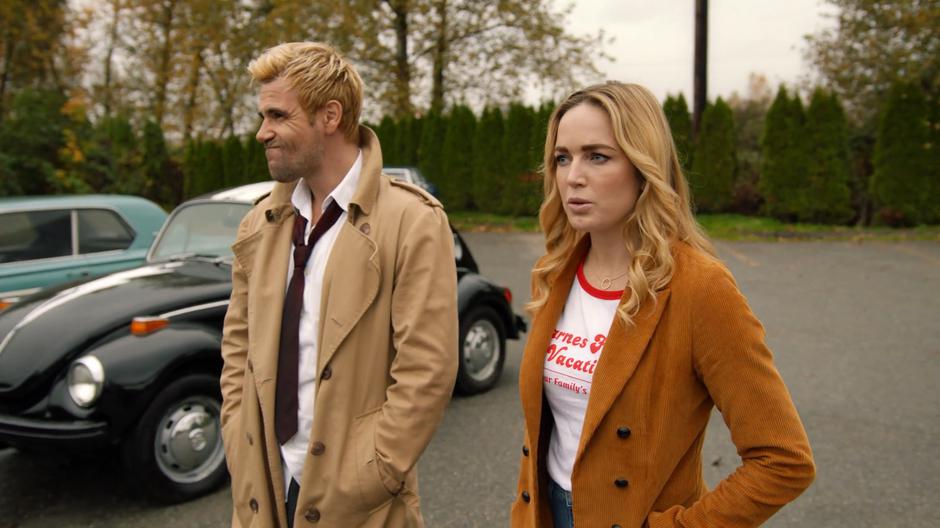 Constantine and Sara look around the parking lot wondering why it is so quiet.