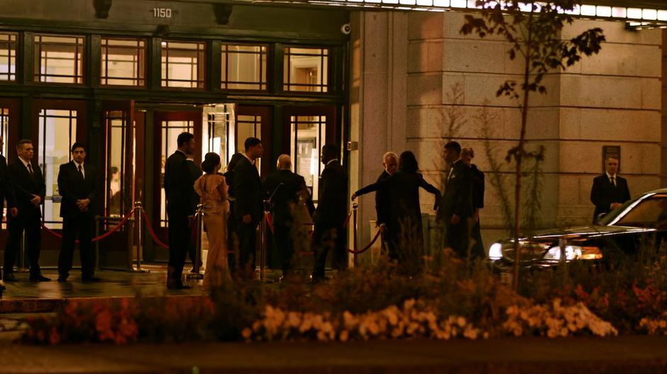 Security checks the guests as the enter the event.