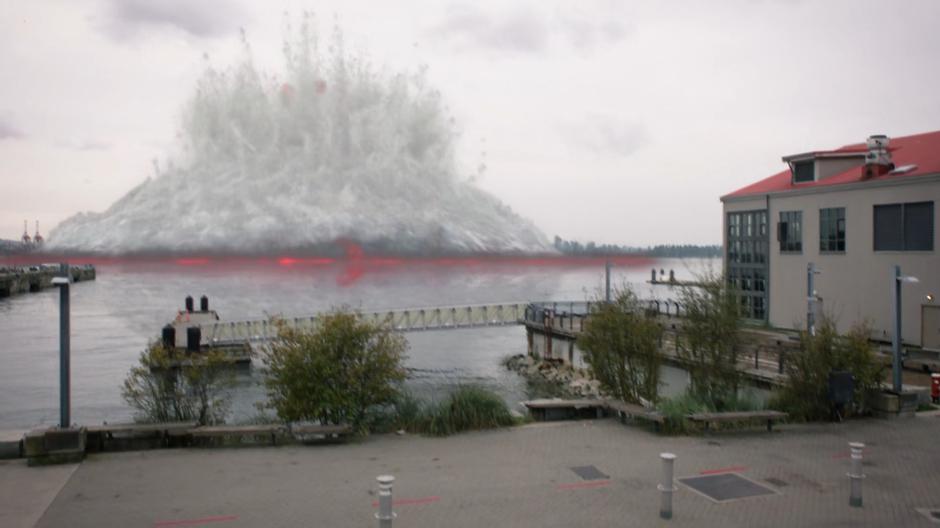 The supervolcano erupts from the surface of the bay.