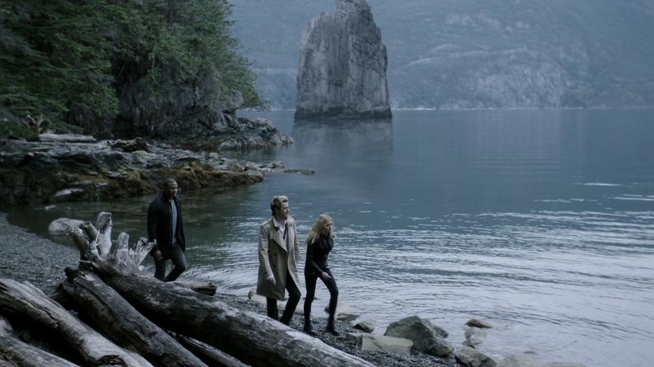 Diggle, Constantine, and Mia walk along the shore looking for Oliver's soul.