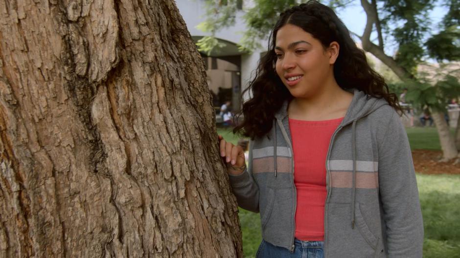 Molly smiles after watching her past self talk to Gert.