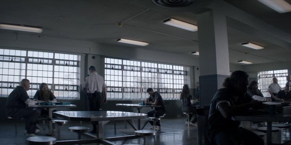 Jacob sits alone in the cafeteria during lunch.