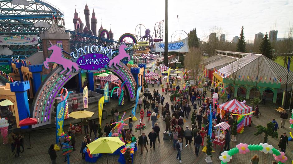 People stream into the newly opened Heyworld past the Unicorn Express ride.