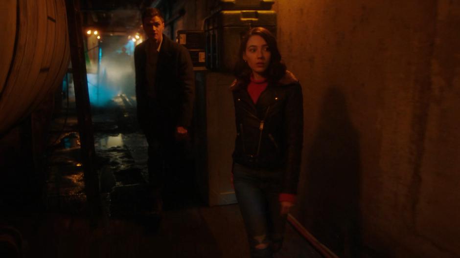 Sue and Ralph head towards the stairs as the guard walks away behind them.