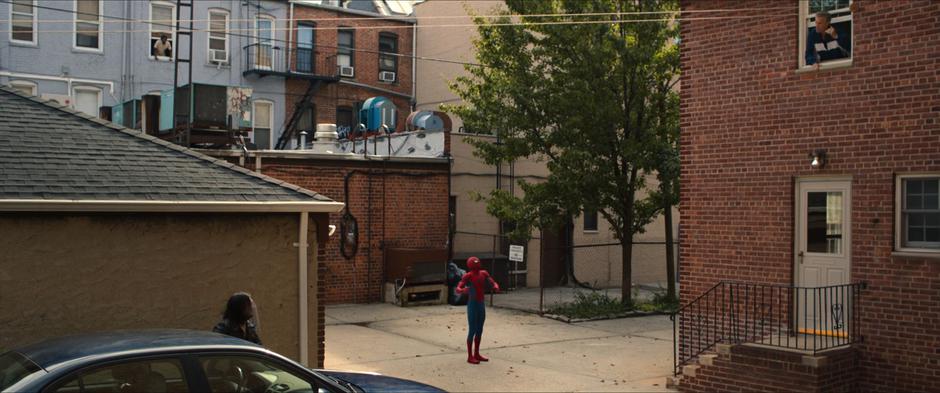 Peter turns to defend himself from people yelling from all around him.