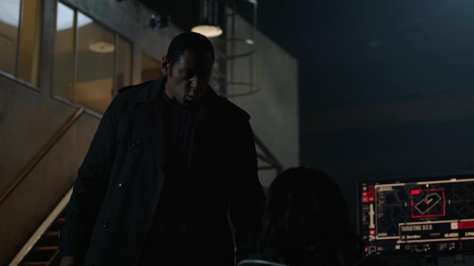 Hank Henshaw leans over Alex as he threatens everyone she loves.