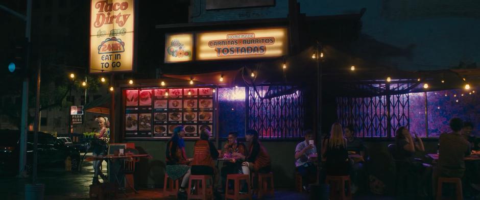 Harley stops at the corner with a tray of margaritas when she hears her roller derby teammates talking about her breakup.