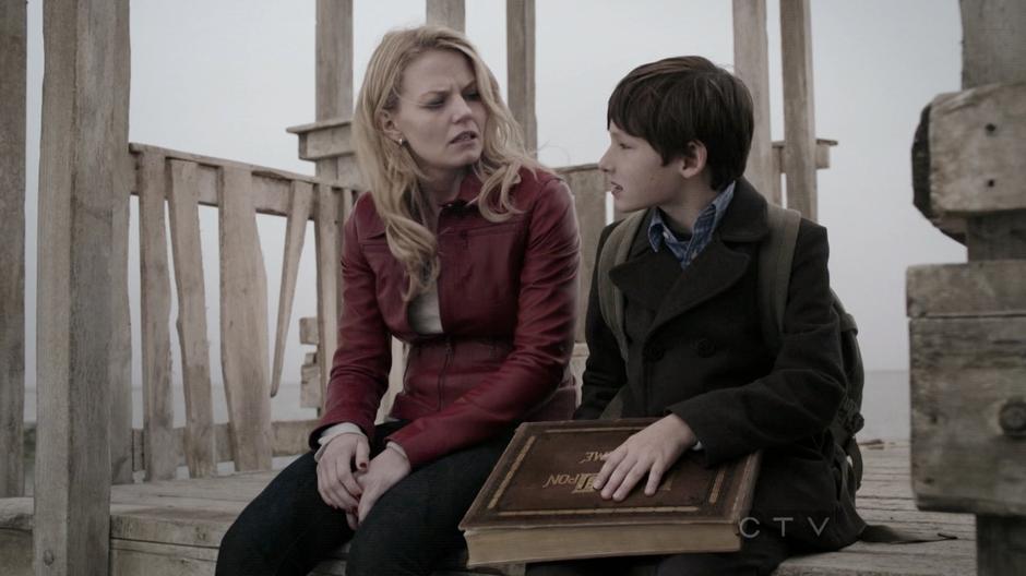 Emma and Henry talk on the castle playground.

From the pilot.
