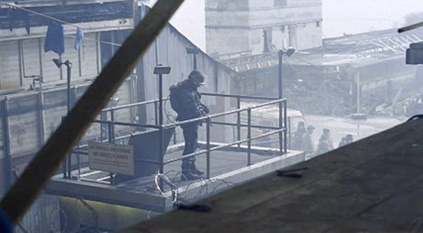 A police officer watches over the market.