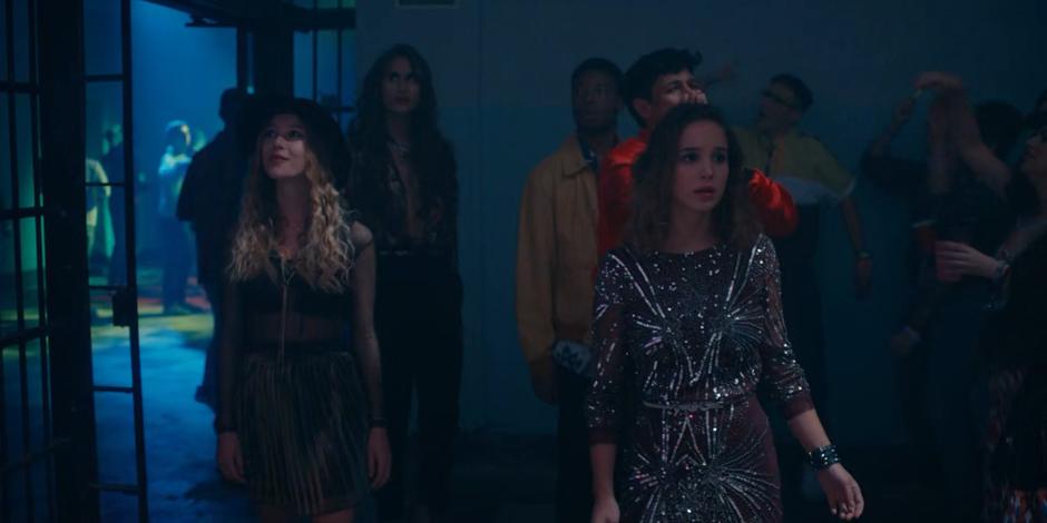 Ava walks into the rave followed by Zori, Chanel, Randall, and JC.