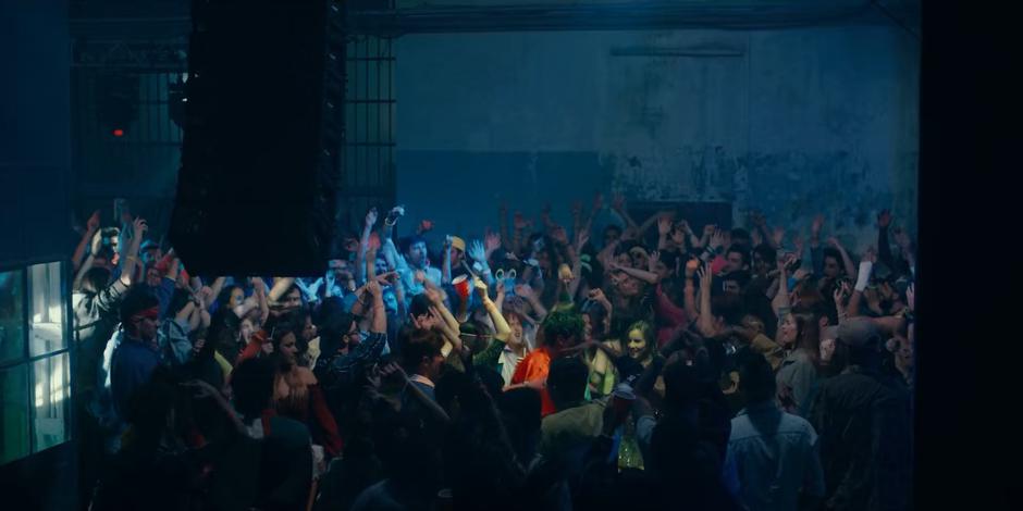 JC and Ava dance in the middle of the crowd.