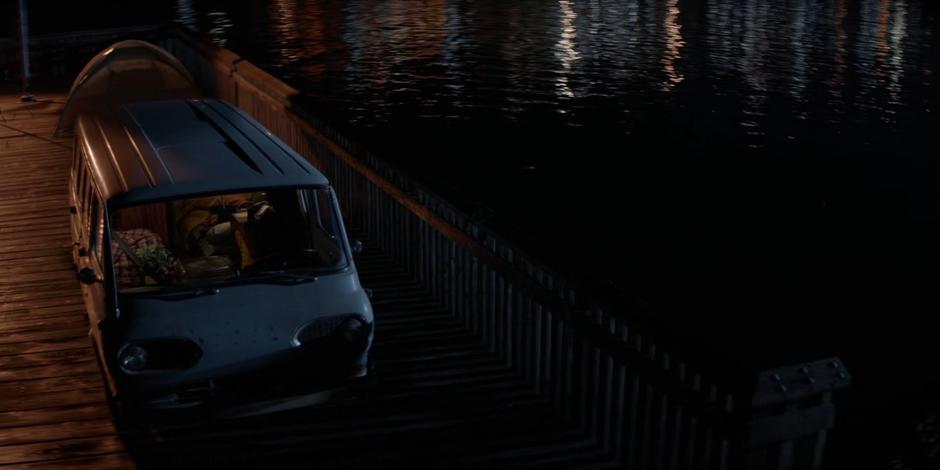 Ryan's van sits on the dock in the park.