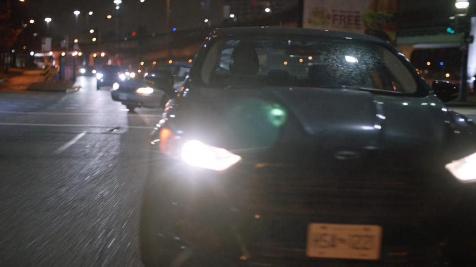 Joe speeds through a red light as his car continues accelerating.