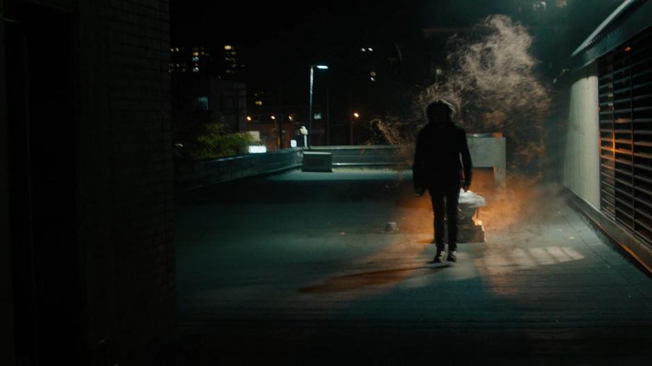 Omon appears in a puff of smoke on the rooftop following Maggie and Julie.