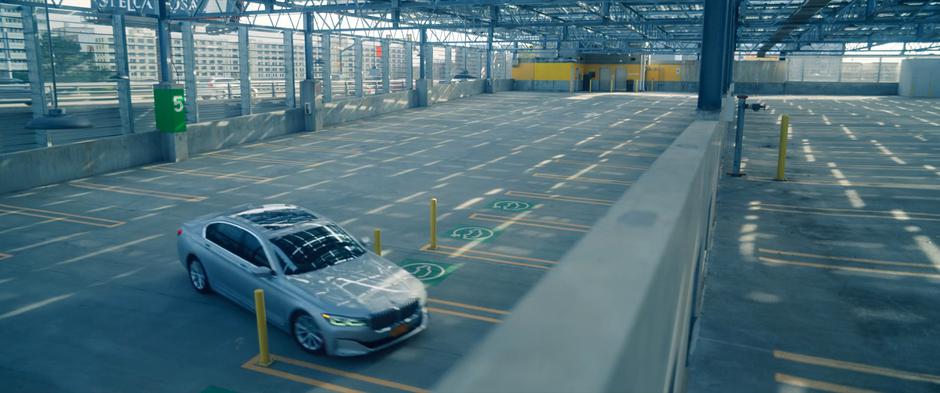 Senator Atwood's car drives around the parking garage outside her control.