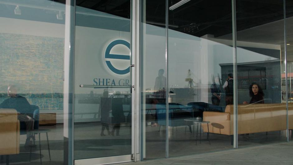 Macy looks around while waiting in the Shea Group lobby.