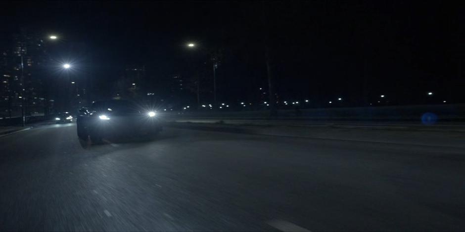 Ryan races after Eli in the Batmobile.