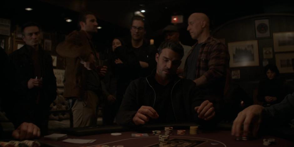 Tavaroff looks down at his chips after Luke goes all-in.