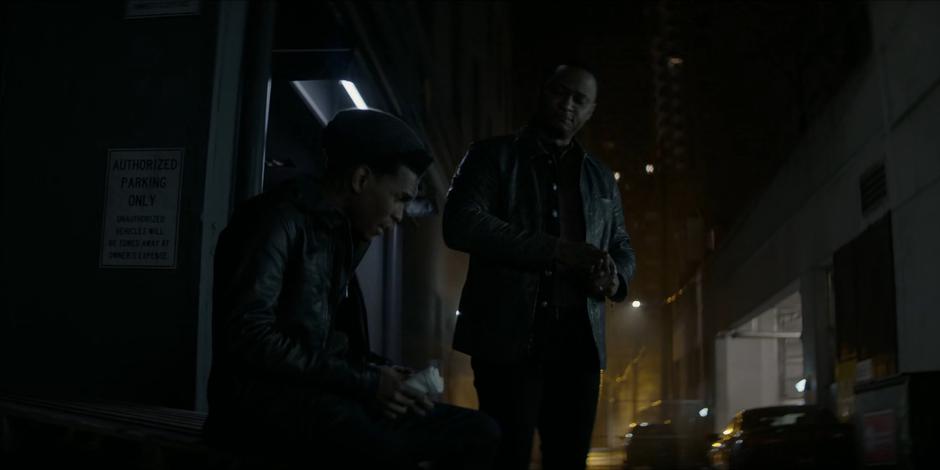 Diggle gives Luke some painkillers after the fight.